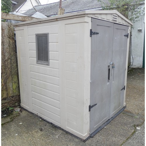 753 - A large plastic garden shed or storage unit with interior floor 65