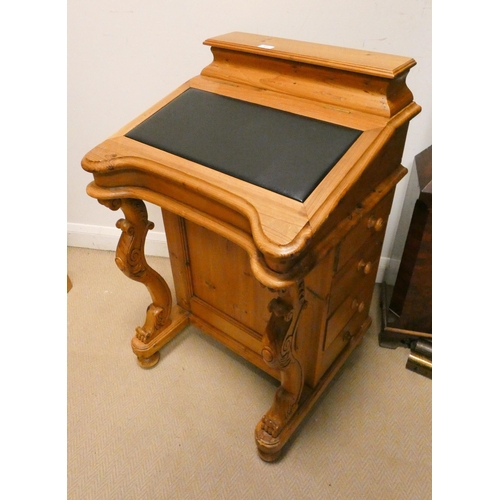 381 - An antique waxed pine Victorian Davenport style desk with inset black leather to the top