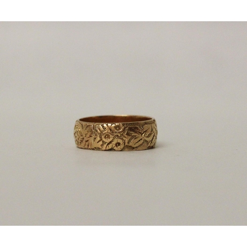 649 - A Victorian 18ct yellow gold wedding band with floral decoration, ring size L, gross weight 5.7 gram... 