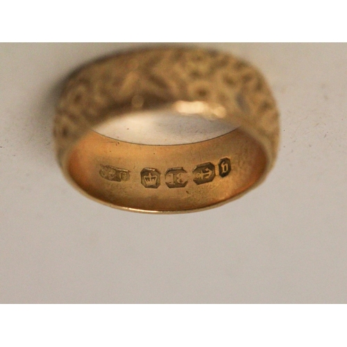 649 - A Victorian 18ct yellow gold wedding band with floral decoration, ring size L, gross weight 5.7 gram... 