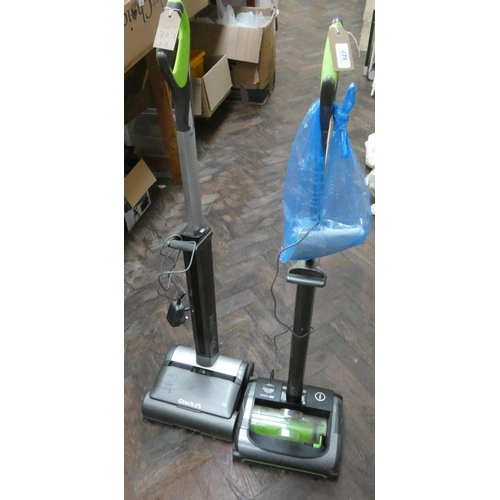 327 - Two G Tech AirRam 22 volt cordless rechargeable upright vacuum cleaners both working with chargers