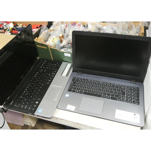 344 - Two laptops with power pack