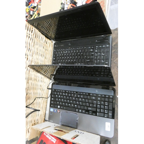 347 - Two assorted laptops, one power pack