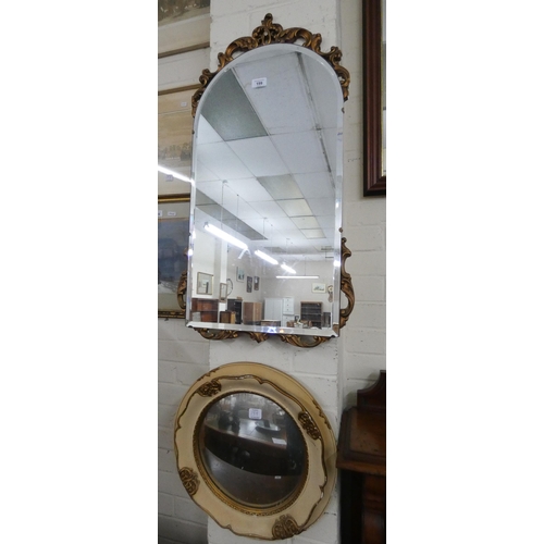 199 - A gilt mounted frameless wall mirror and a circular convex mirror