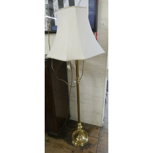 206 - A brass standard lamp with cream shade