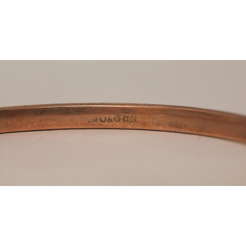 539 - Victorian 9ct rose gold slave bangle, with engraved decoration. 6.4g