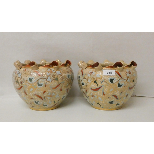 210 - A pair of Doulton Lambeth decorated bulbous shaped jardinières, 9