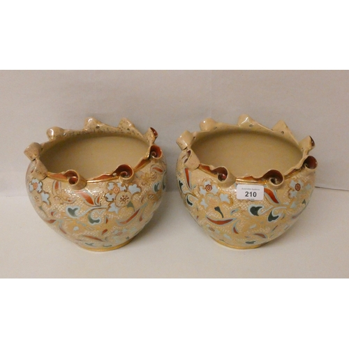 210 - A pair of Doulton Lambeth decorated bulbous shaped jardinières, 9