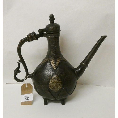 222 - An Indian bronze and decorated teapot, 9 1/2