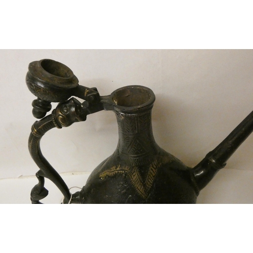 222 - An Indian bronze and decorated teapot, 9 1/2