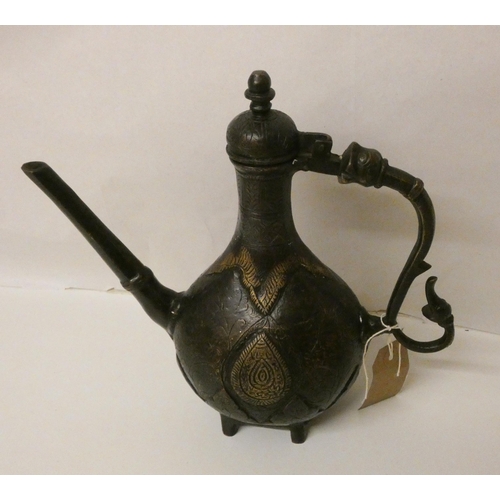 222 - An Indian bronze and decorated teapot, 9 1/2