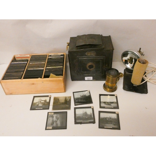 224 - A primus folding magic lantern and a large quantity of assorted slides