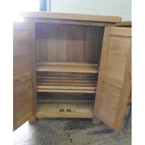 14 - A modern light oak two door cabinet, 28