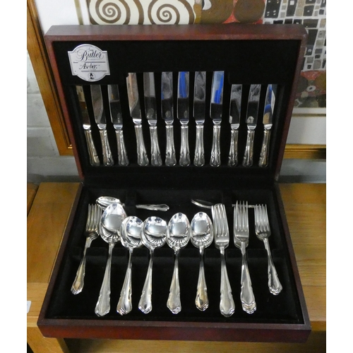 18 - A mahogany canteen of plated cutlery by Butler