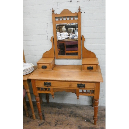 41 - An Edwardian stripped pine dressing table with fitted mirror,