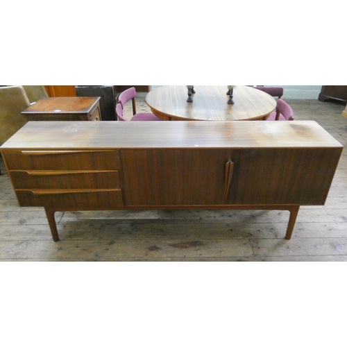 60 - An 1960's/1970's Mackintosh teak long low sideboard fitted three drawers and cupboards, 79