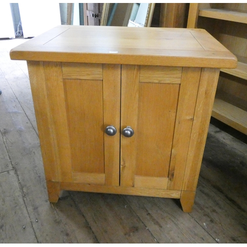 64 - A modern  light oak swivel door CD cabinet