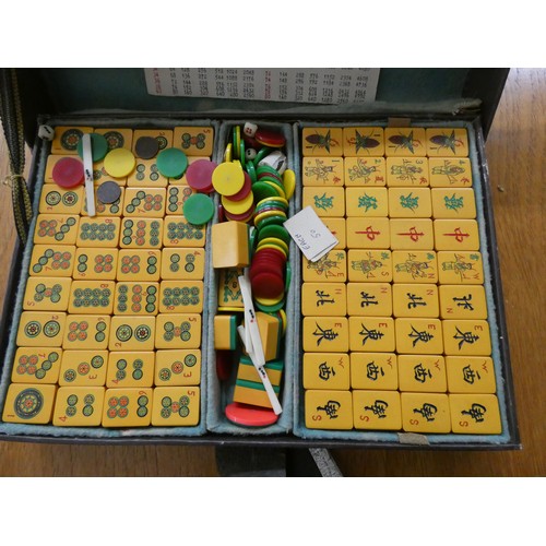 39 - A vintage  Mahjong set with blue lacquer counter boards