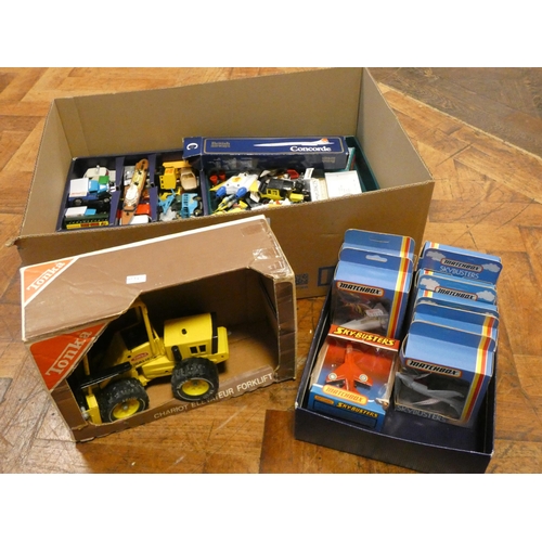 669 - Large quantity of played with model vehicles to include miniature Tonka tractors, and 8 Matchbox Sky... 