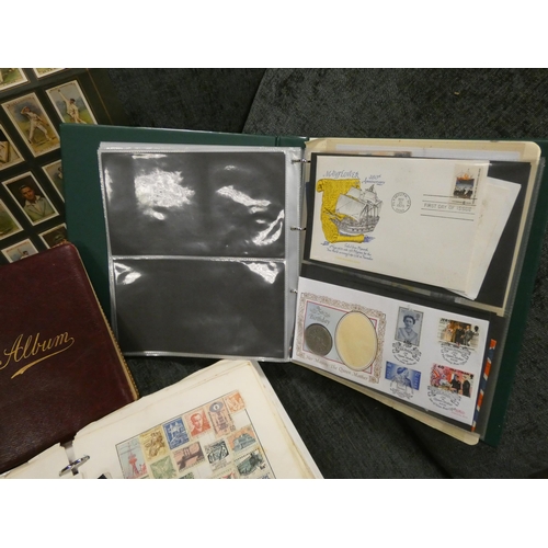 685 - Several albums of World stamps, First Day Covers, Cricketer cigarette cards, photographs and other c... 