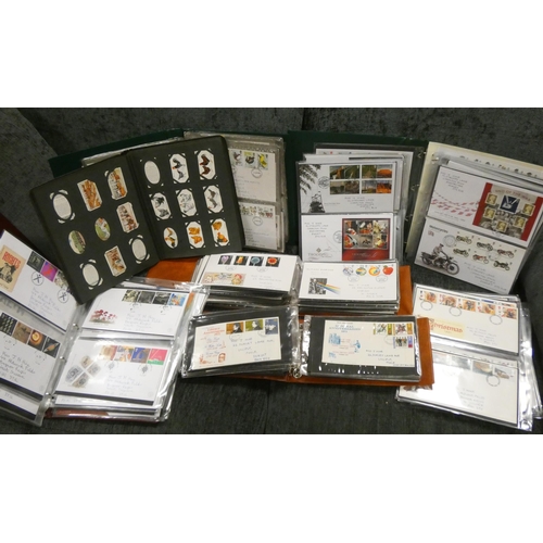 687 - Five albums containing First Day Covers & an album of cigarette cards