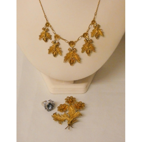 520 - Silver gilt filigree work necklace and a large floral spray brooch. Necklace marked 833 to clasp. 29... 