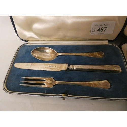 487 - A cased set of six silver pastry knives and a boxed silver christening cutlery set. Weighable silver... 