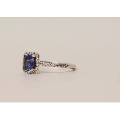 513 - A modern sapphire and diamond square cluster ring, on diamond set shoulders, 18ct white gold band, r... 