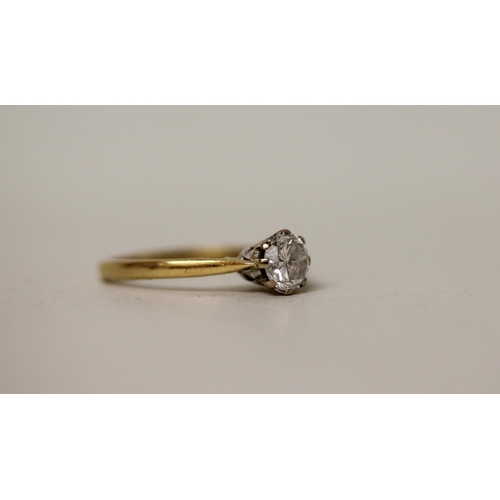 517 - A solitaire diamond engagement ring, the claw set brilliant cut diamond on  hallmarked 18ct yellow g... 