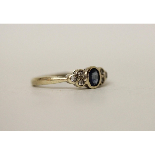 529 - A 9ct gold sapphire and diamond dress ring. Shank misshapen, ring size L approx. 2.4g