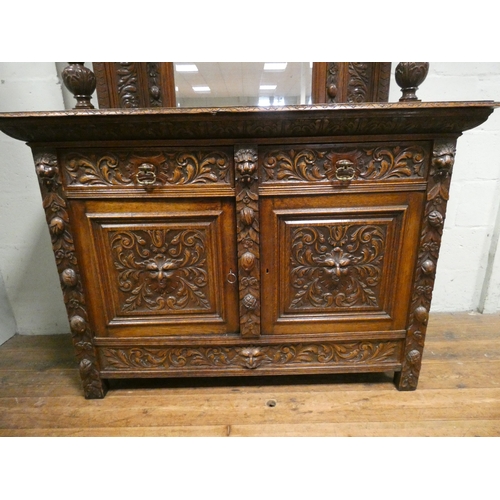 1 - A Victorian carved oak sideboard with mirrored back and barley twist columns, drawers and cupboards ... 