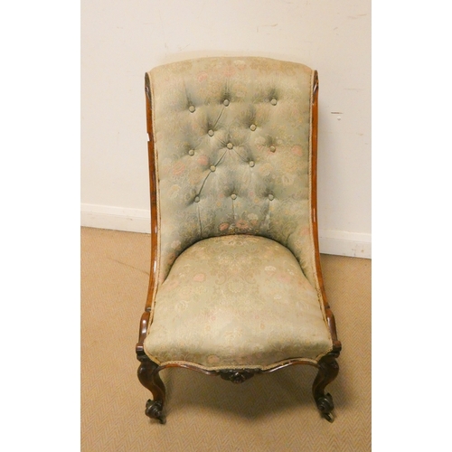 16 - A Victorian walnut framed upholstered occasional chair with button back