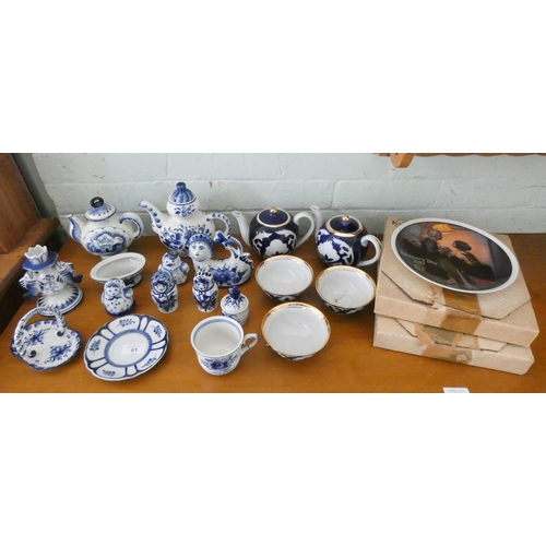 61 - A collection of assorted blue and white china and three wall plates