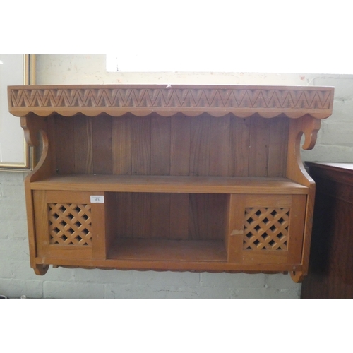 63 - A pine wall hanging kitchen shelf unit