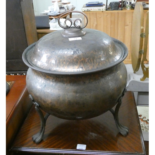 74 - A circular copper oxidised cauldron style coal bin on iron feet