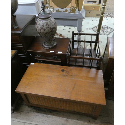 76 - A miniature chest of drawers, a storage box, a music Canterbury and a large table lamp