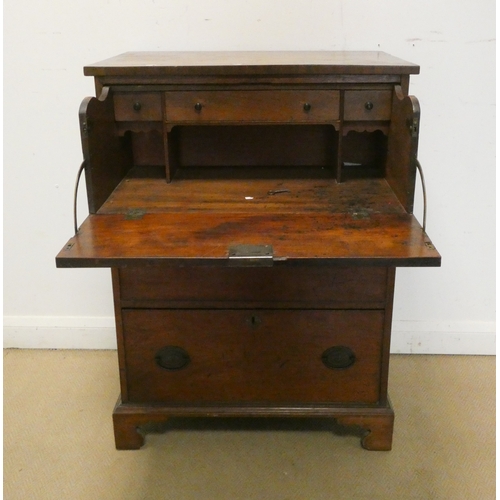 9 - A late Georgian mahogany secretaire chest of three long drawers standing on bracket feet with cross ... 