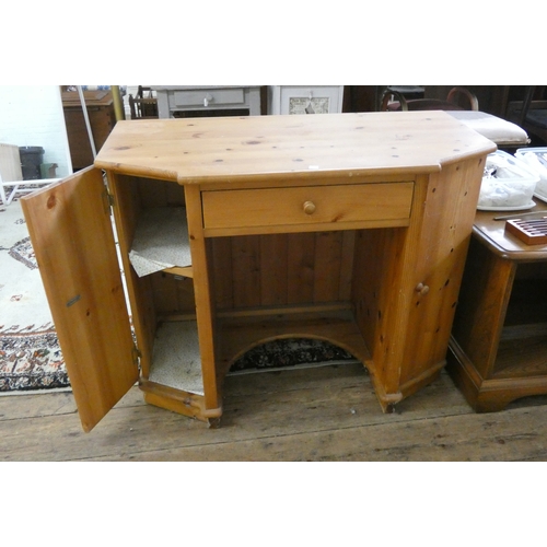 109 - A small modern pine knee-hole desk with shaped top, fitted drawer and cupboards