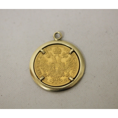 461 - An Austrian gold One Ducat coin, mounted as a pendant in unmarked yellow metal mount. Gross weight 5... 