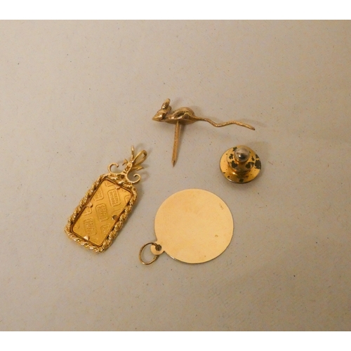 462 - Credit Suisse 999 fine gold 1 gram ingot mounted as a pendant, 14k gold Virgo zodiac pendant and a v... 