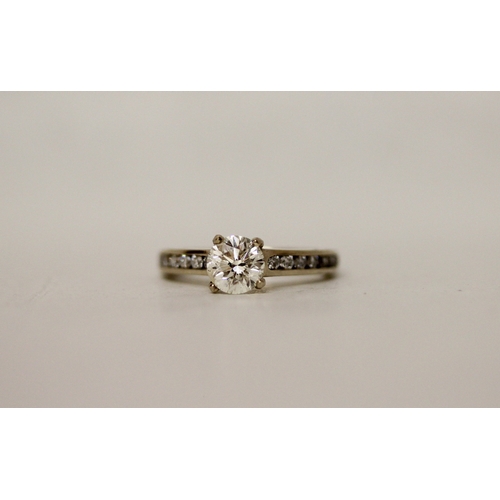 441 - A solitaire diamond ring, the brilliant cut diamond weighing 1.01 carats, claw set to diamond should... 