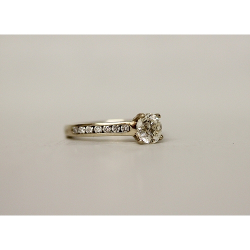 441 - A solitaire diamond ring, the brilliant cut diamond weighing 1.01 carats, claw set to diamond should... 