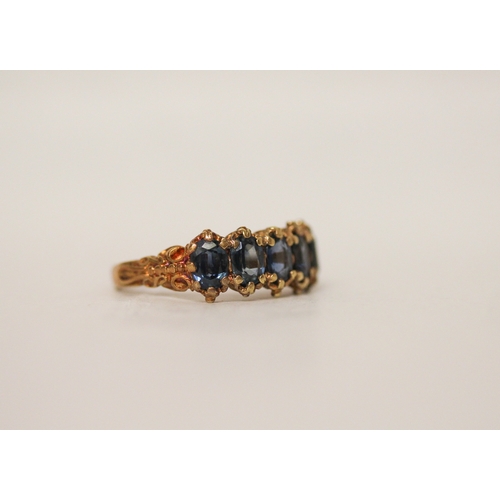 442 - A five stone sapphire ring in an 18ct gold Victorian style setting, ring size S, 5.4 grams,