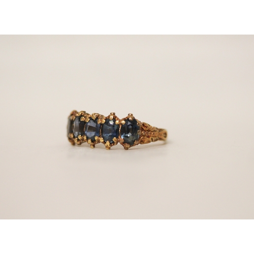 442 - A five stone sapphire ring in an 18ct gold Victorian style setting, ring size S, 5.4 grams,