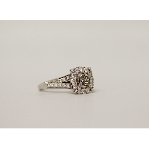 450 - A modern 9ct gold diamond cluster ring, ring size K, 2.7 grams,