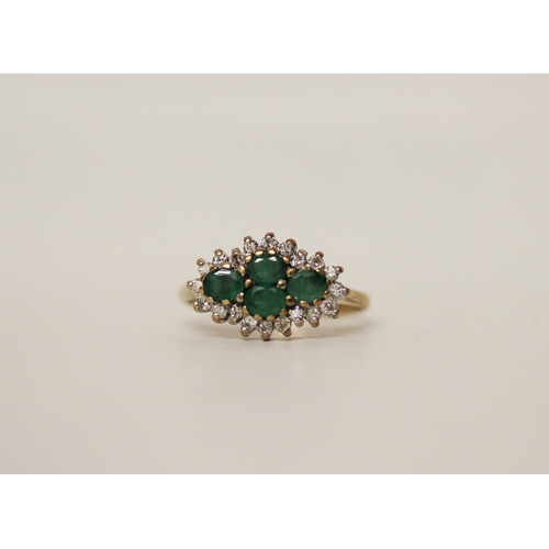 453 - A four stone emerald and diamond cluster ring on hallmarked 9ct band, ring size L, 2.7 grams