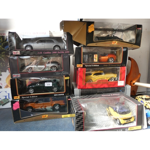 Eight full boxes of special edition large die cast model cars and three ...