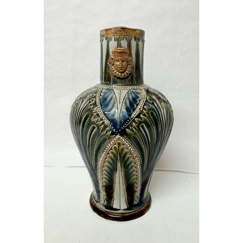 198 - Doulton Lambeth Stoneware mask jug, impressed marks 533, 19cms tall