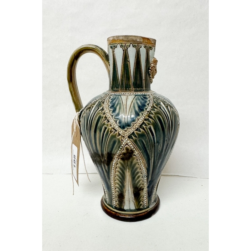 198 - Doulton Lambeth Stoneware mask jug, impressed marks 533, 19cms tall