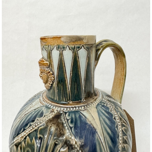 198 - Doulton Lambeth Stoneware mask jug, impressed marks 533, 19cms tall